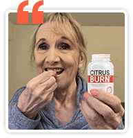 Verified Citrus Burn customer testimonial: senior woman taking a metabolism support capsule while holding the product bottle.