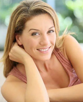 Happy American woman sharing CitrusBurn metabolism support supplement review and weight loss results